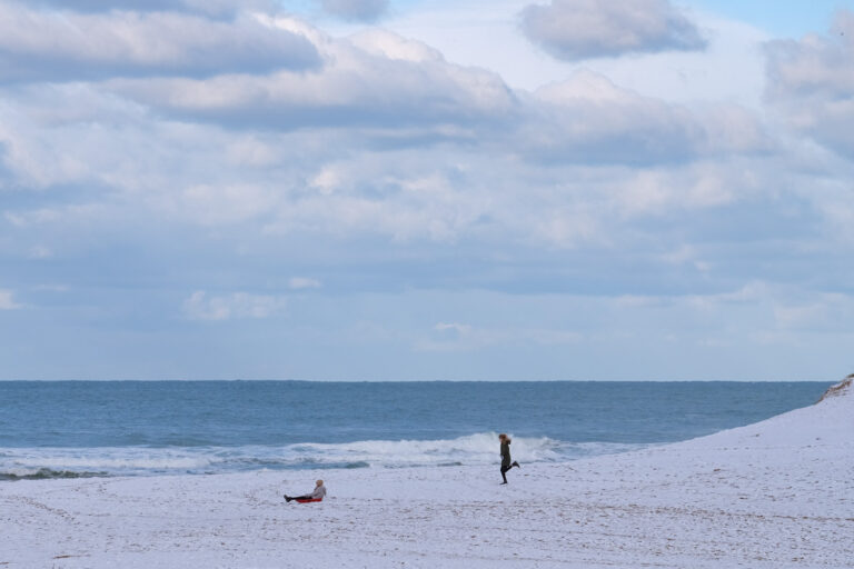 Snow on Holywell bay beach